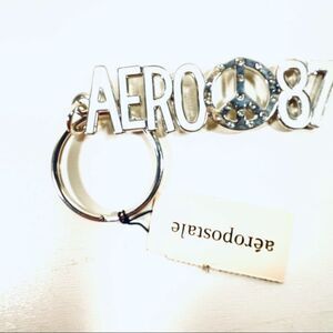 NWT Aeropostale Metallic Peace Sign White Keychain